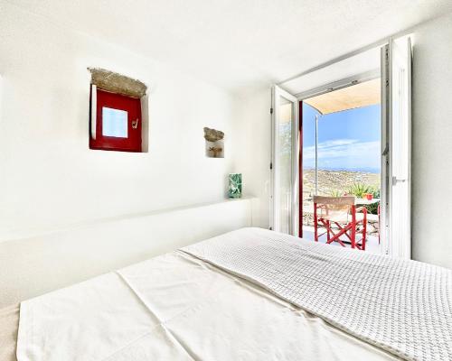 Postel nebo postele na pokoji v ubytování Mykonos Love Nest