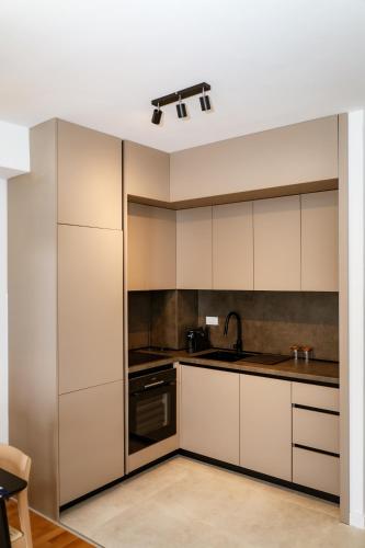 O bucătărie sau chicinetă la Apartment 82