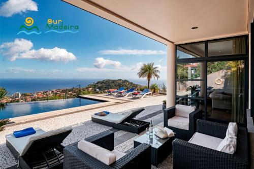 an ocean view from the patio of a villa at OurMadeira - Villa Luz in Funchal