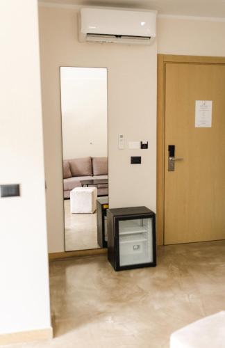 Llit o llits en una habitació de Ritson Hotel