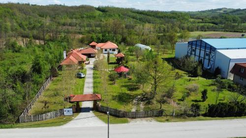 an overhead view of a house with a yard at Kuca za odmor Agro-Mobil doo Guca in Guča