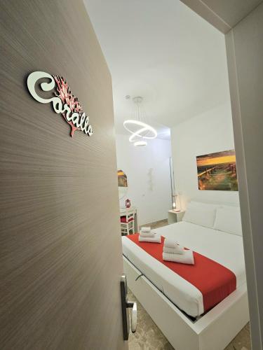 Katil atau katil-katil dalam bilik di Albatros B&B Porto Cesareo