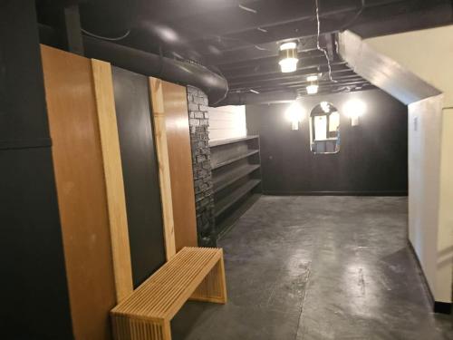 a room with a bench in the middle of it at The Chelsea in Dayton