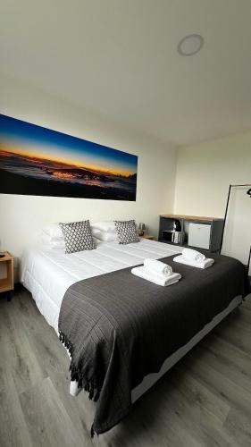 Ένα ή περισσότερα κρεβάτια σε δωμάτιο στο LN GuestHouse