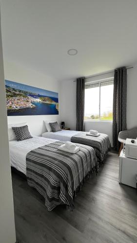 Ένα ή περισσότερα κρεβάτια σε δωμάτιο στο LN GuestHouse