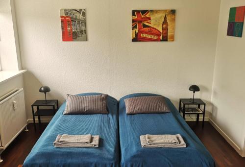 Postel nebo postele na pokoji v ubytování H&M Homes Apartments