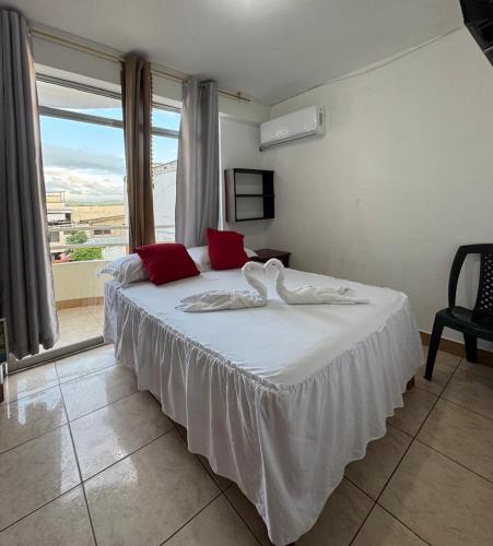 Ένα ή περισσότερα κρεβάτια σε δωμάτιο στο HOTEL PAL-MAR