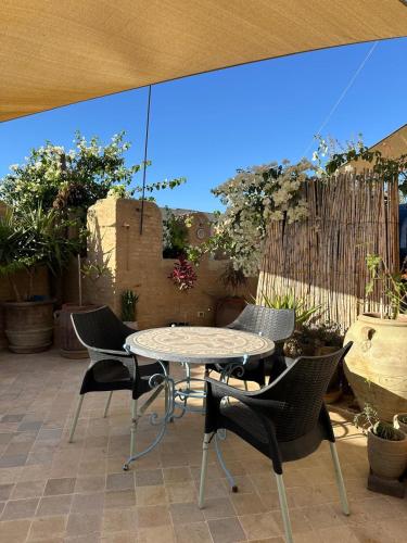 Un patio o zona al aire libre en Suite Printemps Ryan
