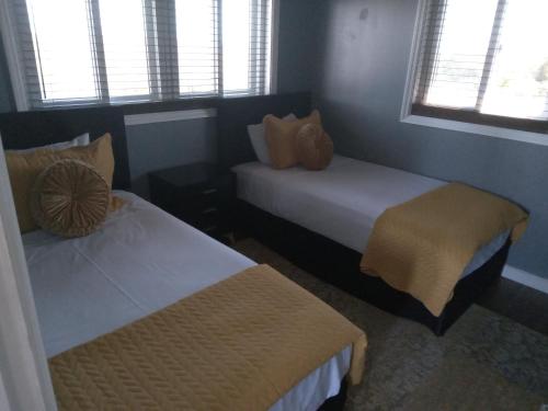 Katil atau katil-katil dalam bilik di Vacation Haven