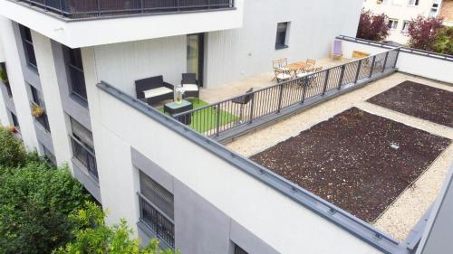 Photo de la galerie de l'établissement Luxury apartment near Paris Defense Wifi Parking, à Bois-Colombes