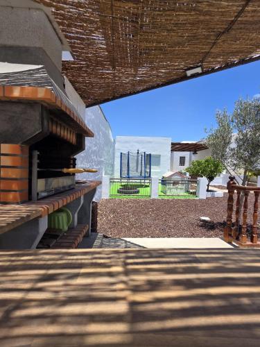 a view of the beach from a patio of a house at Villa Narok in Tarajalejo