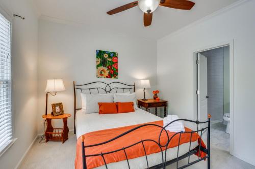 a bedroom with a bed and a ceiling fan at Home on Lake Lanier with Dock and Water Views in Gainesville