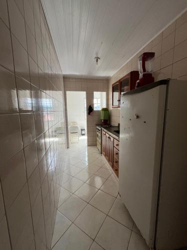 Dapur atau dapur kecil di Pé na Areia Piúma
