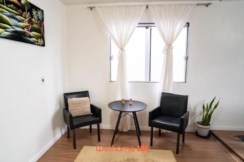 Et opholdsområde på Casa em Passo Fundo com Churrasqueira