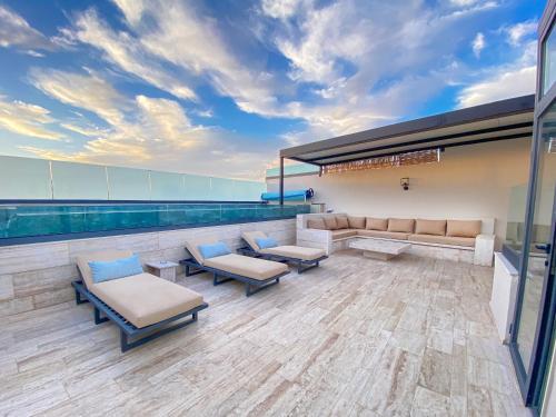Triplex de luxe piscine privée chauffée 3 chambresにあるシーティングエリア