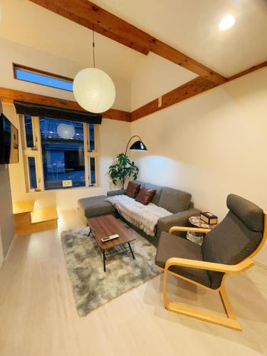 Zona de estar de NewOpen!SMILE HOUSE close to USJ, EXPO, 2bedrooms, Mario Kidsroom Max6ppl