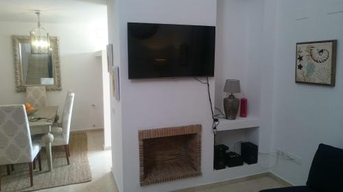 TV a/nebo společenská místnost v ubytování Villa Aznalcazar