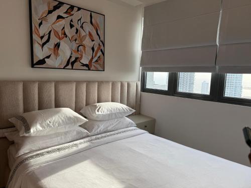 Rúm í herbergi á Stylish Apartment in Colombo
