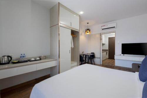 Amana Hotel & Residencesにあるベッド