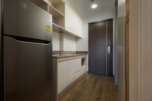 Amana Hotel & Residencesにあるキッチンまたは簡易キッチン