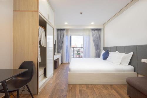 Amana Hotel & Residencesにあるベッド