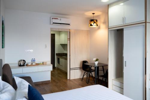 Amana Hotel & Residencesにあるベッド