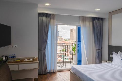 Amana Hotel & Residencesにあるベッド