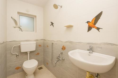 Bilik mandi di Gold Coin Boutique Apartments