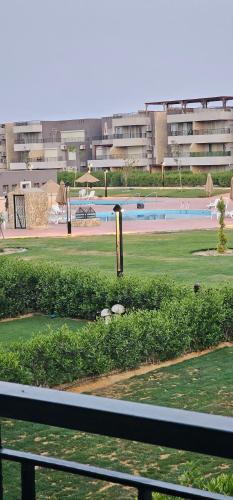 a swimming pool in front of a building at بيت الروبي in Ain Sokhna