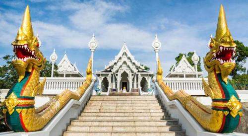 a set of stairs leading to a white building at The Nest Krabi Hotel in Ao Nang Beach
