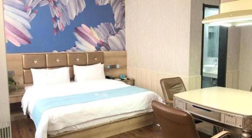Ένα ή περισσότερα κρεβάτια σε δωμάτιο στο PAI Hotel·Linfen Hongdong Lily Town