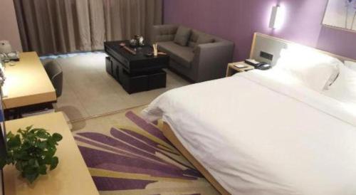Letto o letti in una camera di Lavande Hotel·Yichun Wanda, High Speed Railway Station