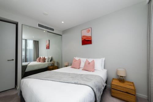 Ένα ή περισσότερα κρεβάτια σε δωμάτιο στο Pier 25 - 3 Bedroom Apartment Kingston Foreshore