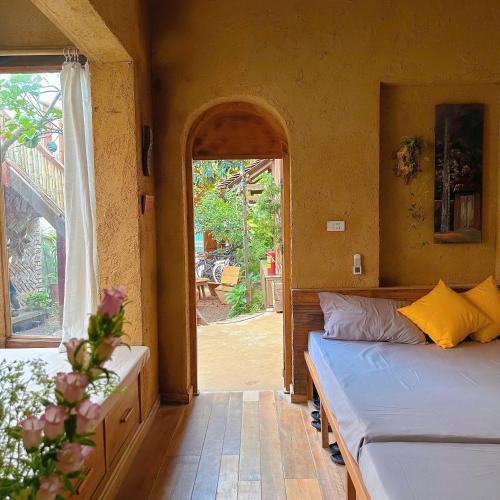Postel nebo postele na pokoji v ubytování Đoài homestay Đường Lâm