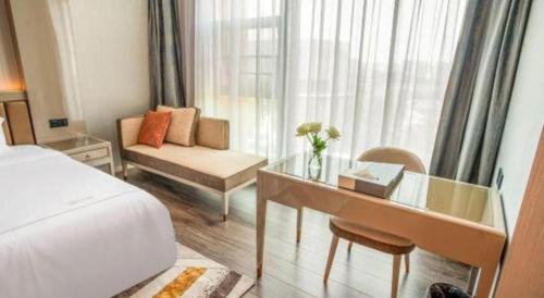 Katil atau katil-katil dalam bilik di Tomeet Hotel