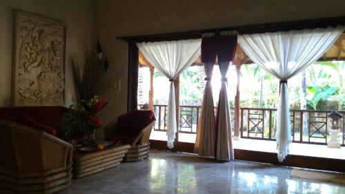 Posezení v ubytování Teluk Indah Beach & Pool Villa