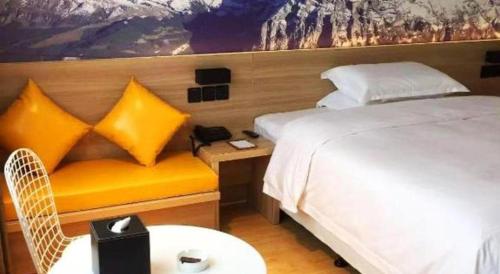 Zhangjiagang Guomao Hotelにあるベッド