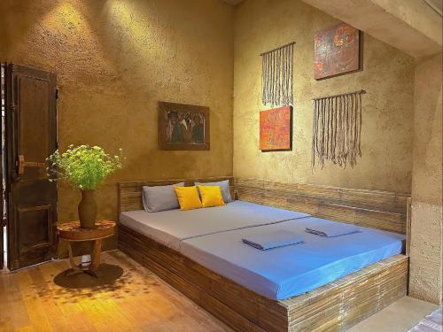 Postel nebo postele na pokoji v ubytování Đoài homestay Đường Lâm