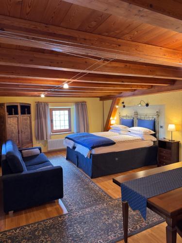 En eller flere senge i et værelse på La Thuillettaz