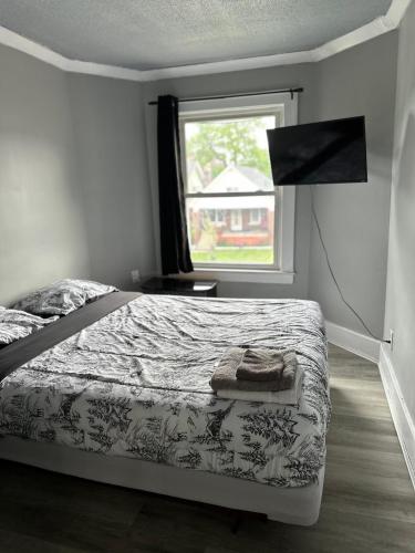Ένα ή περισσότερα κρεβάτια σε δωμάτιο στο Upper Floor 2 bedroom Unit