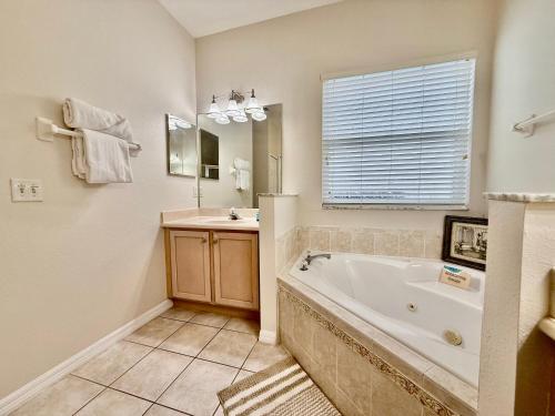 Grand Village 4BR Pool Home near Disney Parks photo 24