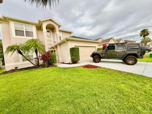 Grand Village 4BR Pool Home near Disney Parks photo 8
