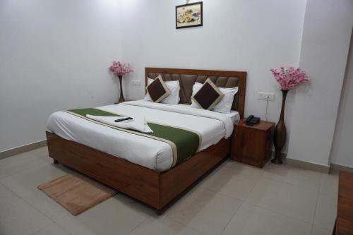 Postel nebo postele na pokoji v ubytování Hotel Frolic Stay