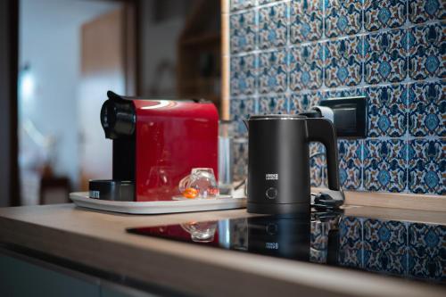 a coffee maker sitting on a counter in a kitchen at Affittacamere Vista Lago in Città della Pieve