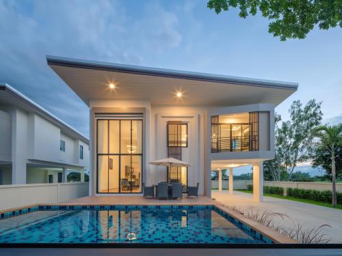 a rendering of a house with a swimming pool at Kanna Pool Villa in Chiang Mai