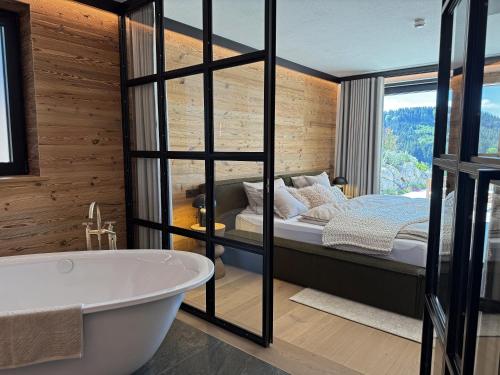 Ένα ή περισσότερα κρεβάτια σε δωμάτιο στο Chalet Mädesüss