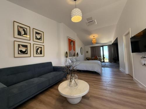 a living room with a couch and a table at V.V. Verde Amanecer 3 in Las Casas