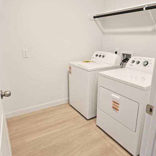a laundry room with a washer and dryer at Quiet Haven in Richmond