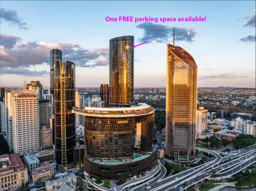 a group of tall buildings in a city at Queens Wharf Diamond Level 60, Sleep 5, 1 carpark in Brisbane