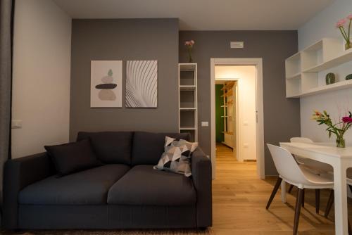 Ein Sitzbereich in der Unterkunft Design a 2 passi dal mare